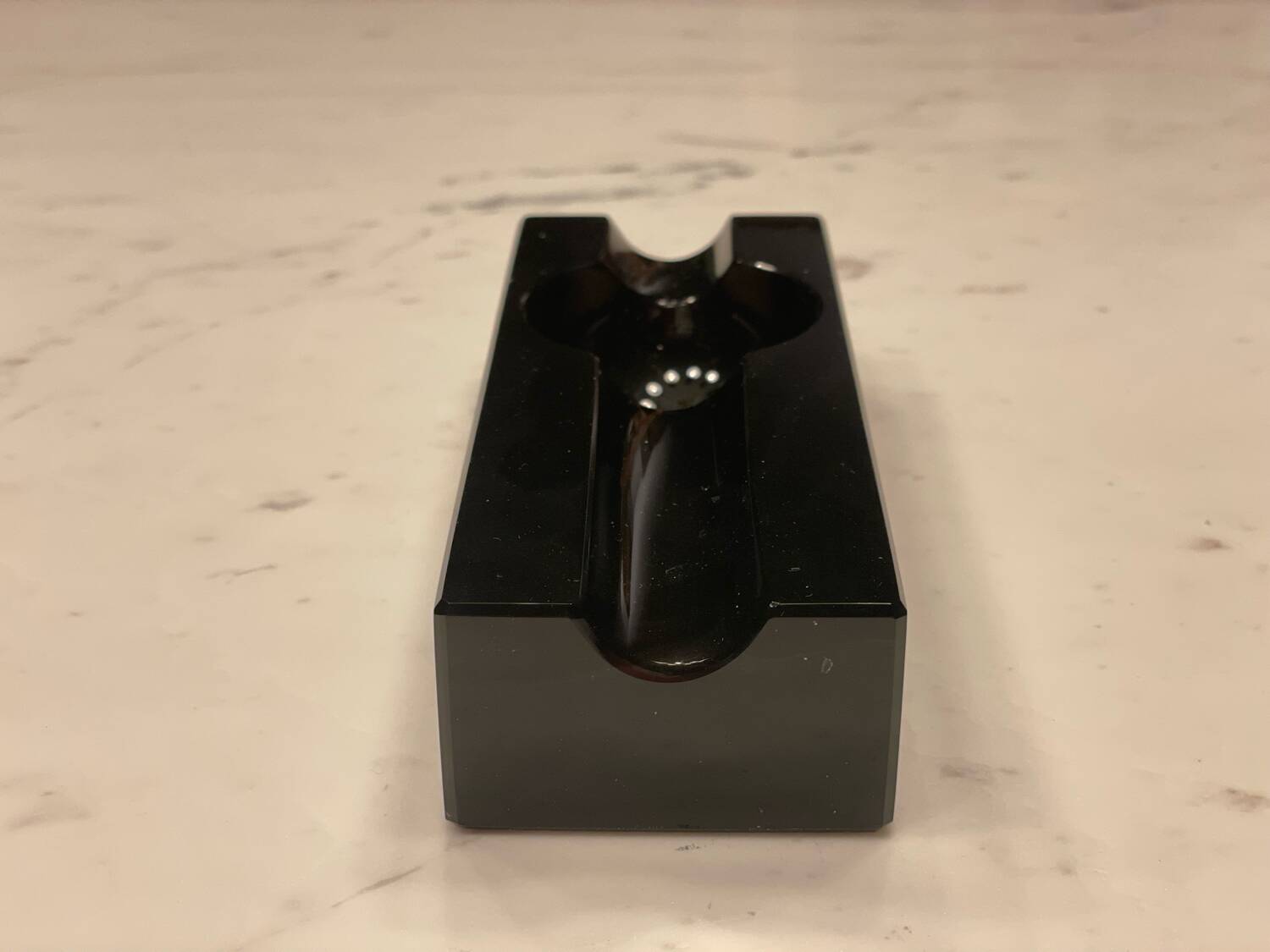 Individual cigar ashtray in black glass