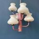 Mid-century opaline glass chandelier with a pink structure.