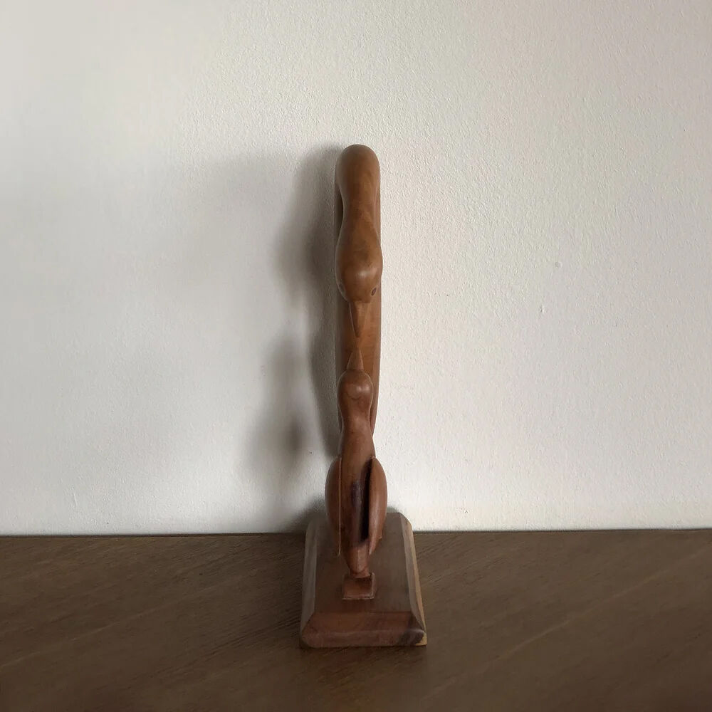 Sculpture of a goose feeding its young