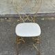 Vintage heart chair from the 1950s Hollywood Regency in gold metal.