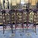 3 curved wooden bar stools