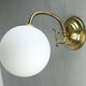 Mid-century brass & opaline sconce