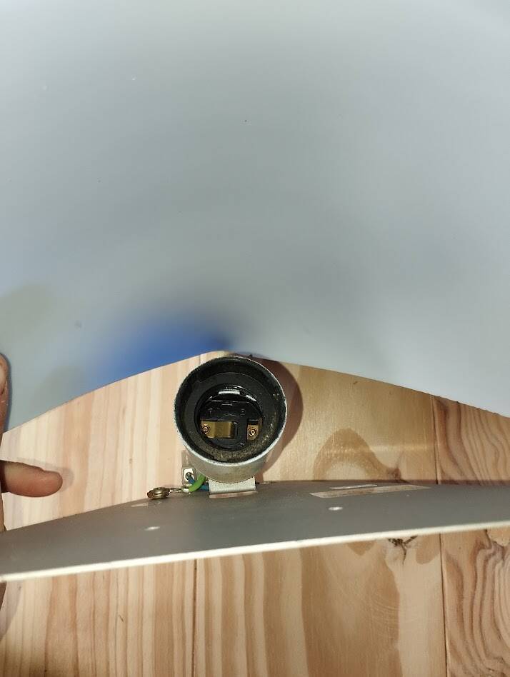 a pair of Ikea Kvintett wall lamps