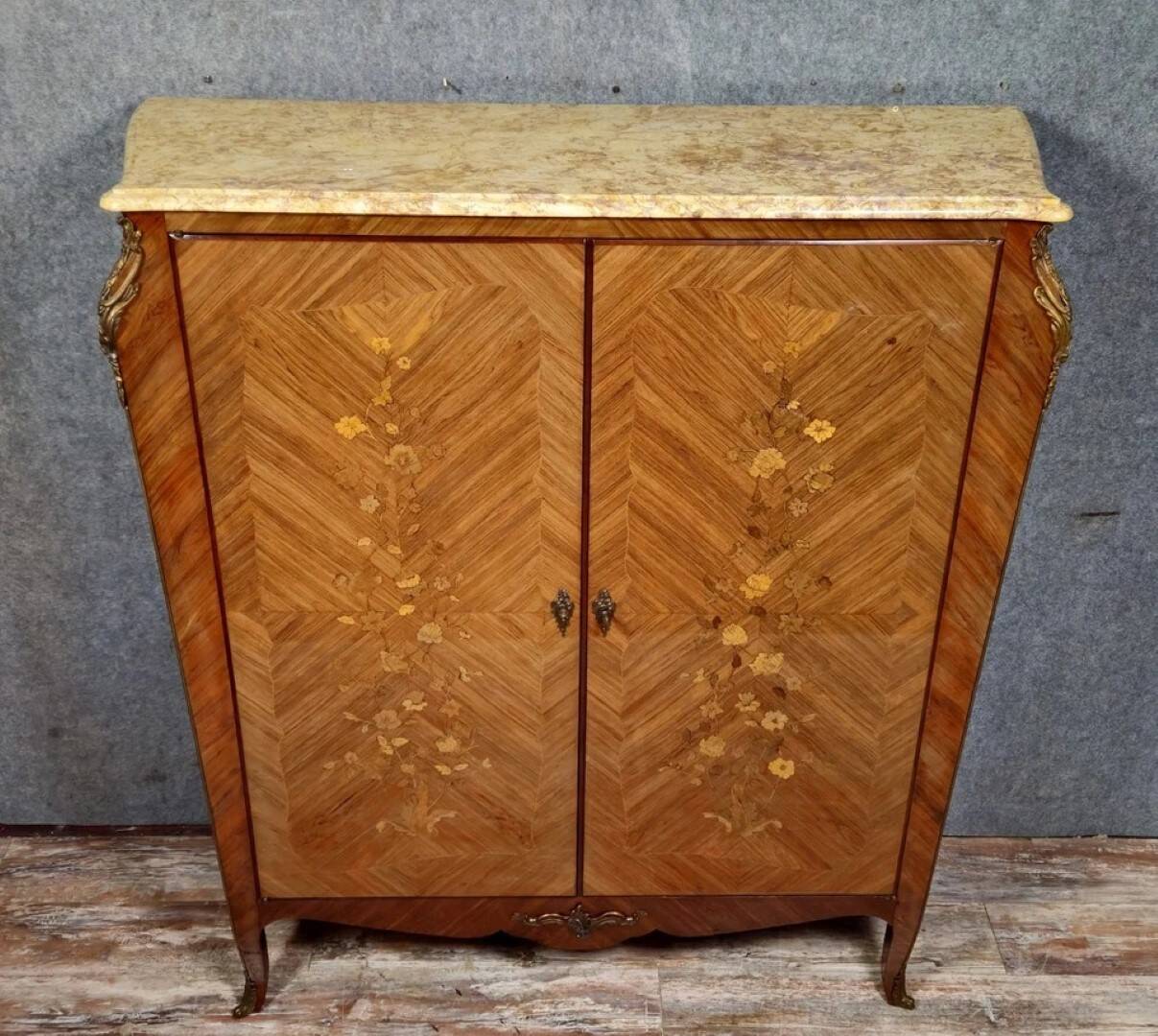 Curved Louis XV style armoire with floral marquetry, 20th century period.