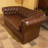 brown leather 2-seater Chesterfield sofa