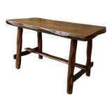 Small rustic table made of solid wood.