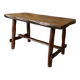 Small rustic table made of solid wood.