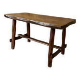 Small rustic table made of solid wood.