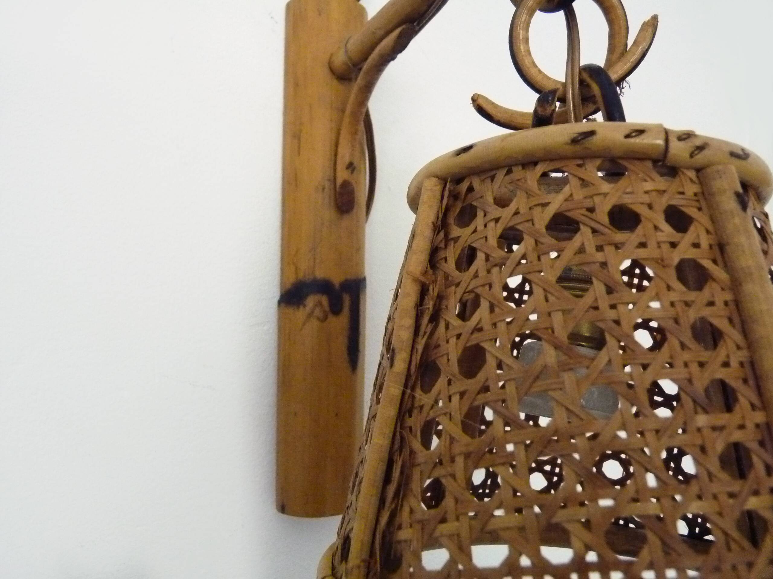Pair of rattan and cane lantern wall lights. 1950s-1960s