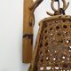 Pair of rattan and cane lantern wall lights. 1950s-1960s