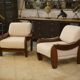 Brutalist pair of armchairs in mahogany and cream boucle 1970s.