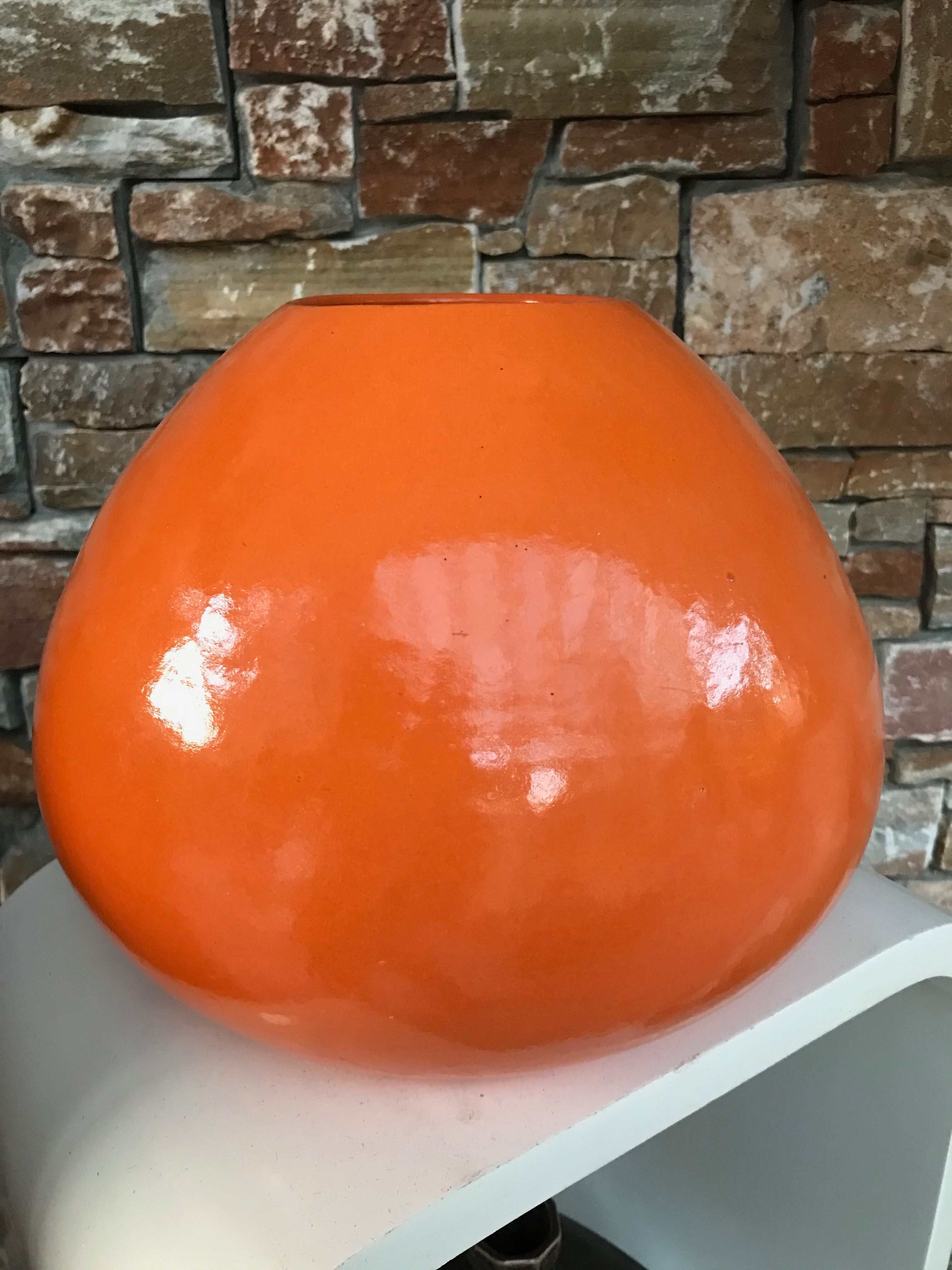 Orange terracotta vase