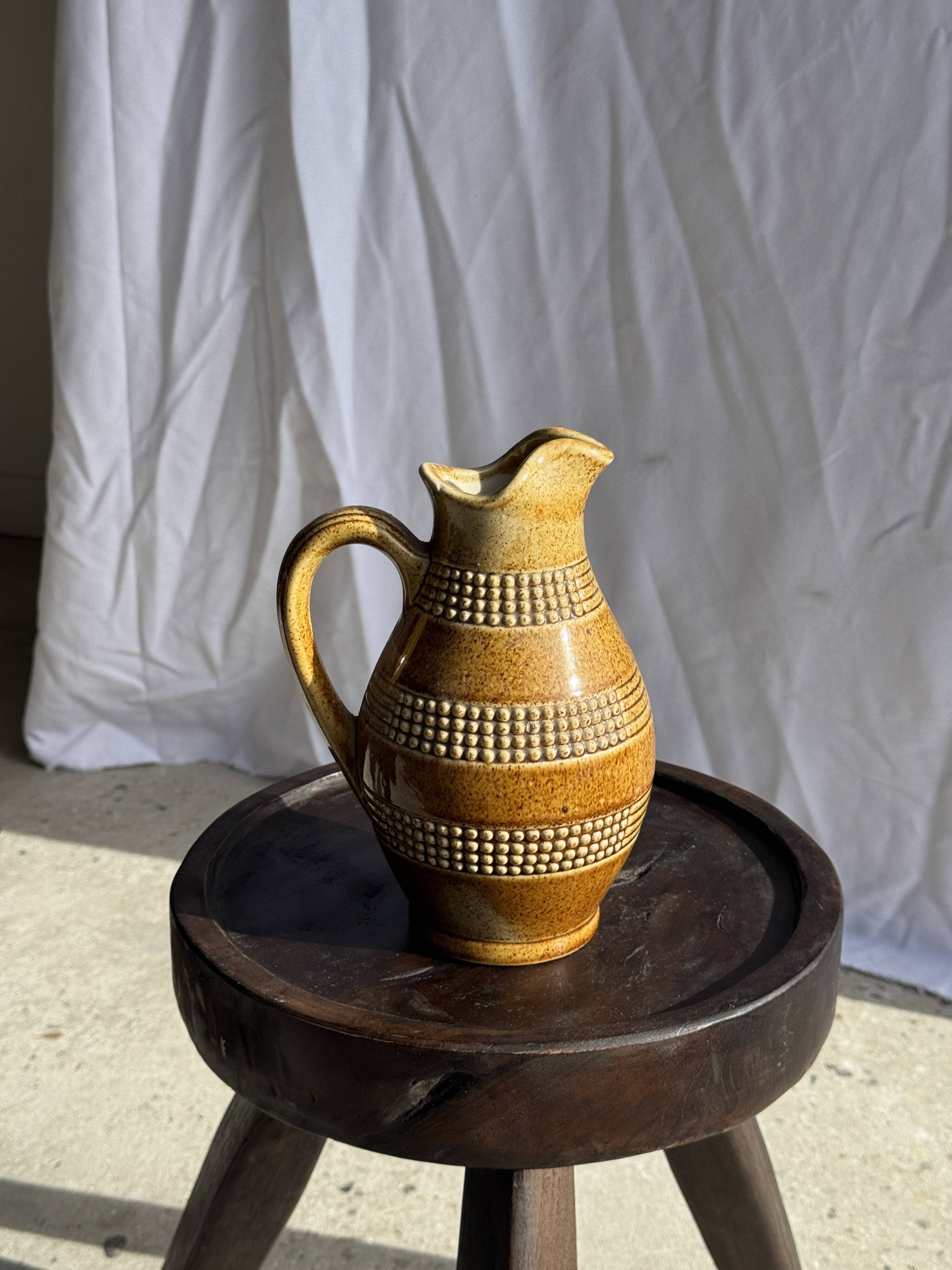 Vintage yellow stoneware carafe with beaded friezes Made in France H22