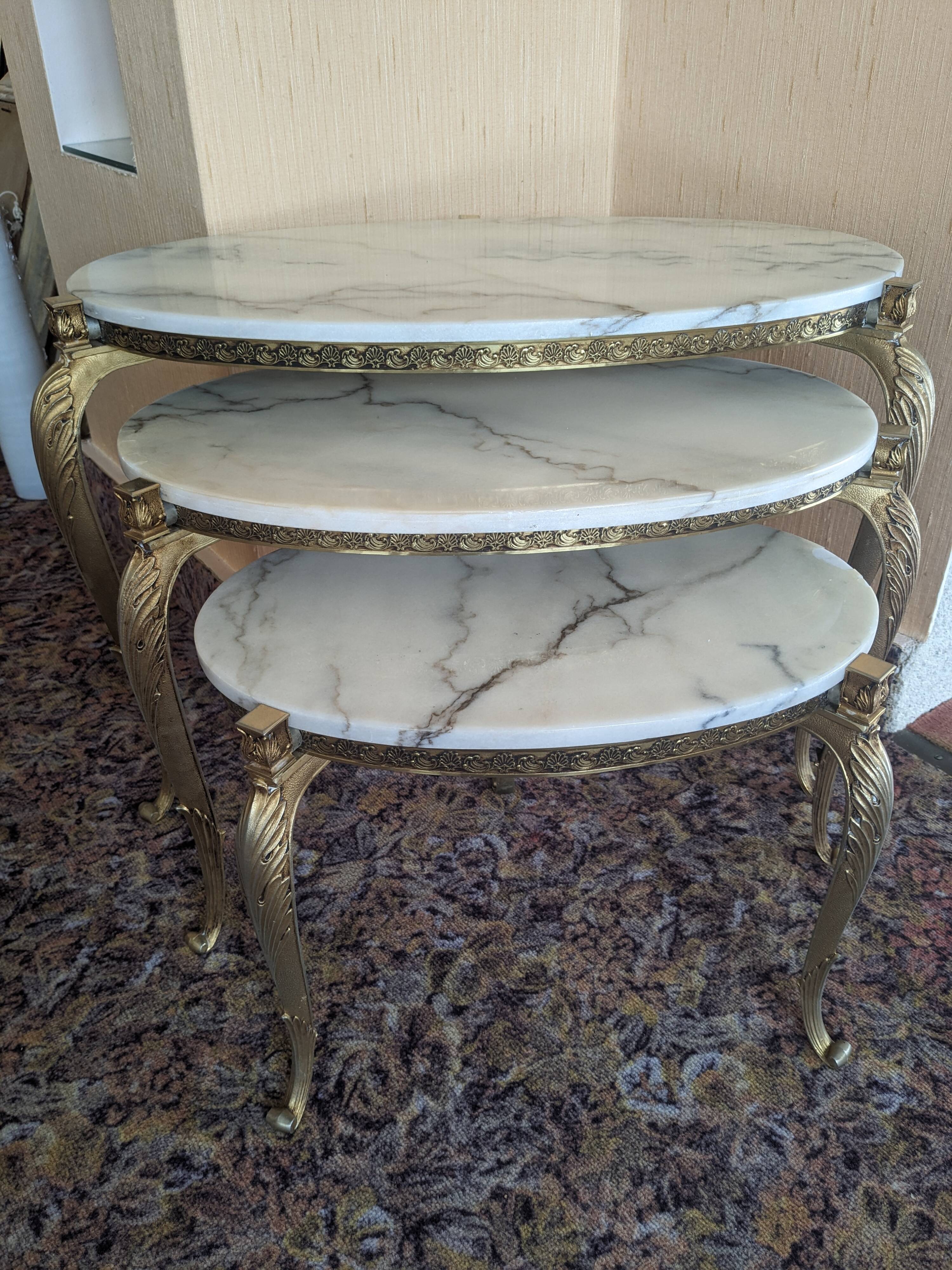 Nesting tables in white marble and bronze