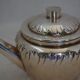 Teapot and milk jug English silverware