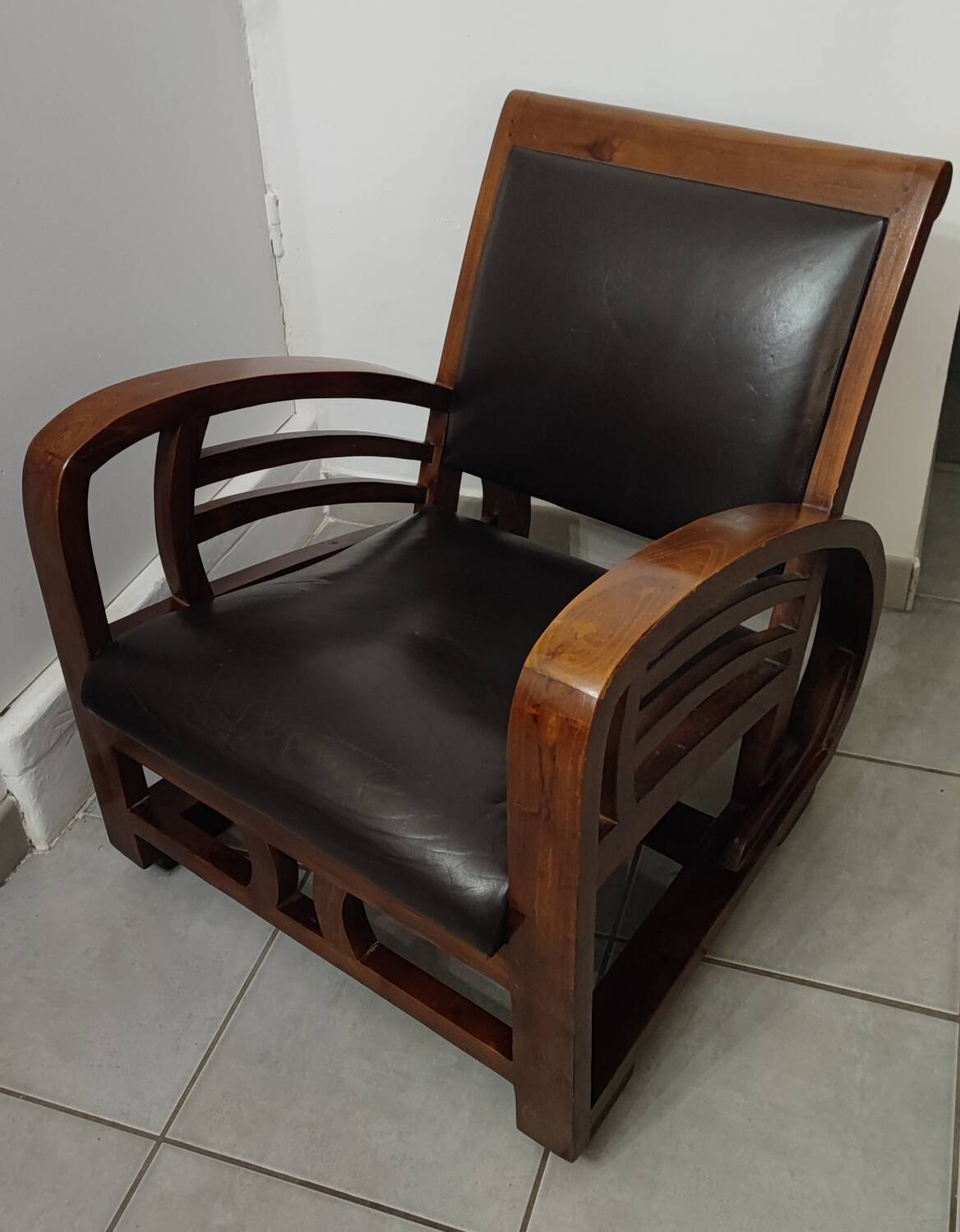 Leather and teak armchair
