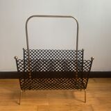 Perforated metal magazine door