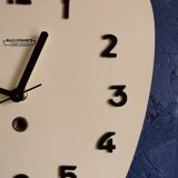 Clock formica vintage asymmetrical silent wall clock "Manufrance pale yellow"