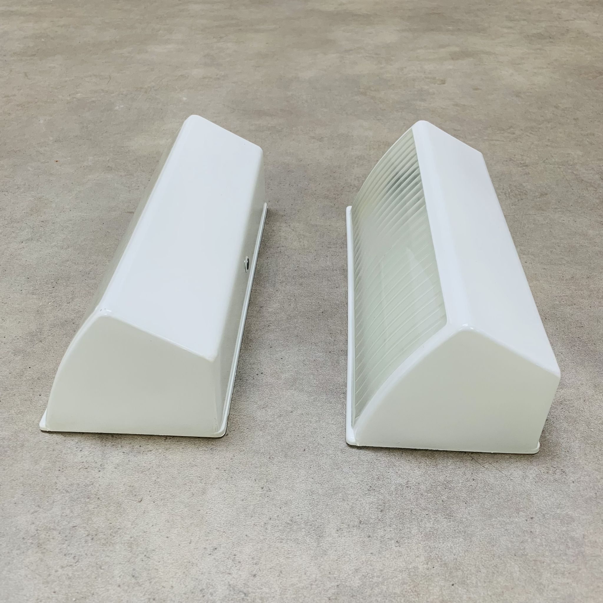 Pair of Holophane Prismopal wall lights, 1950s design.