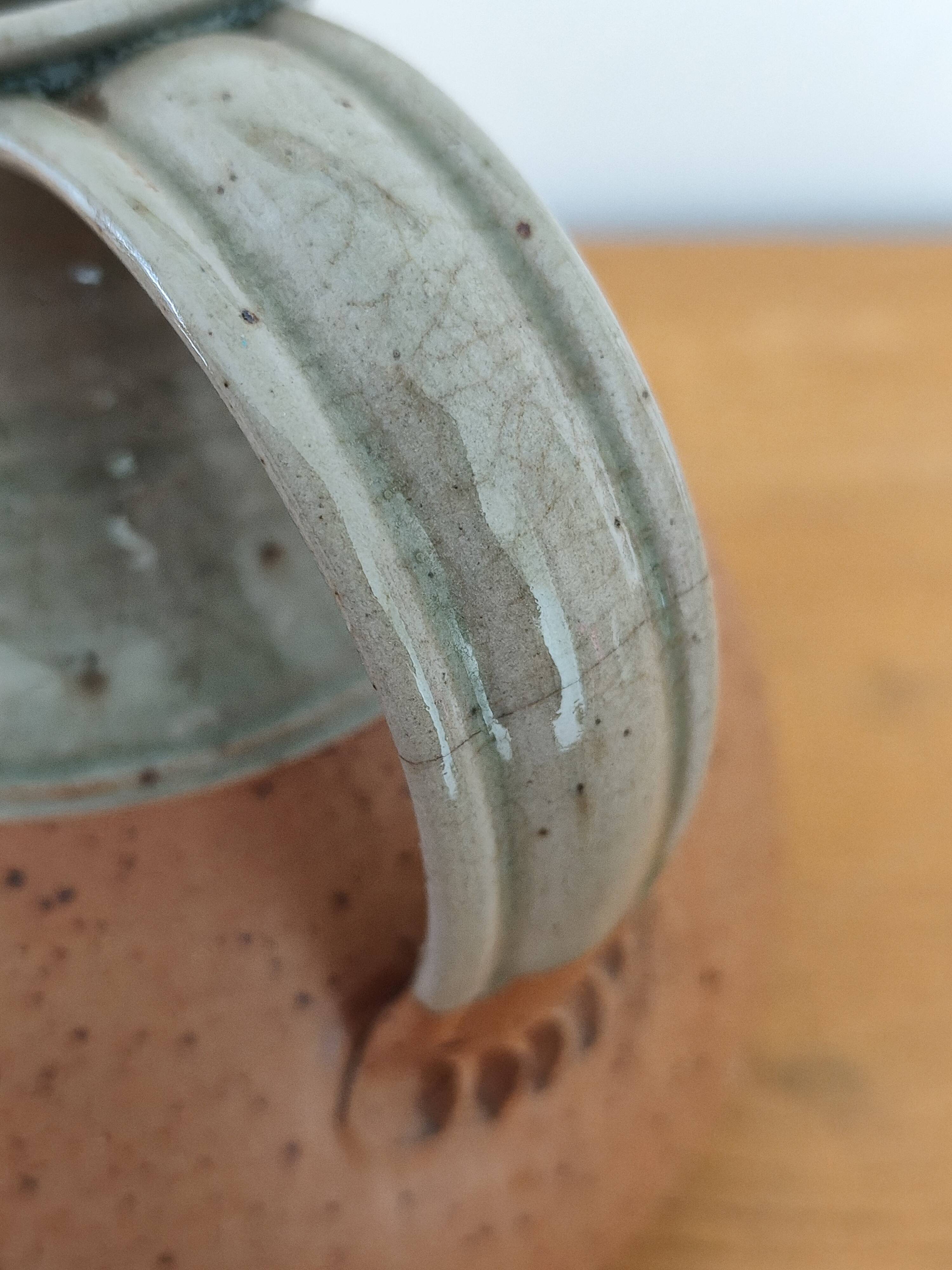 Stoneware and ceramic pitcher signed Roger Boureau