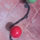 Vintage wall coat rack "Atomic" in wrought iron with multicoloured balls.