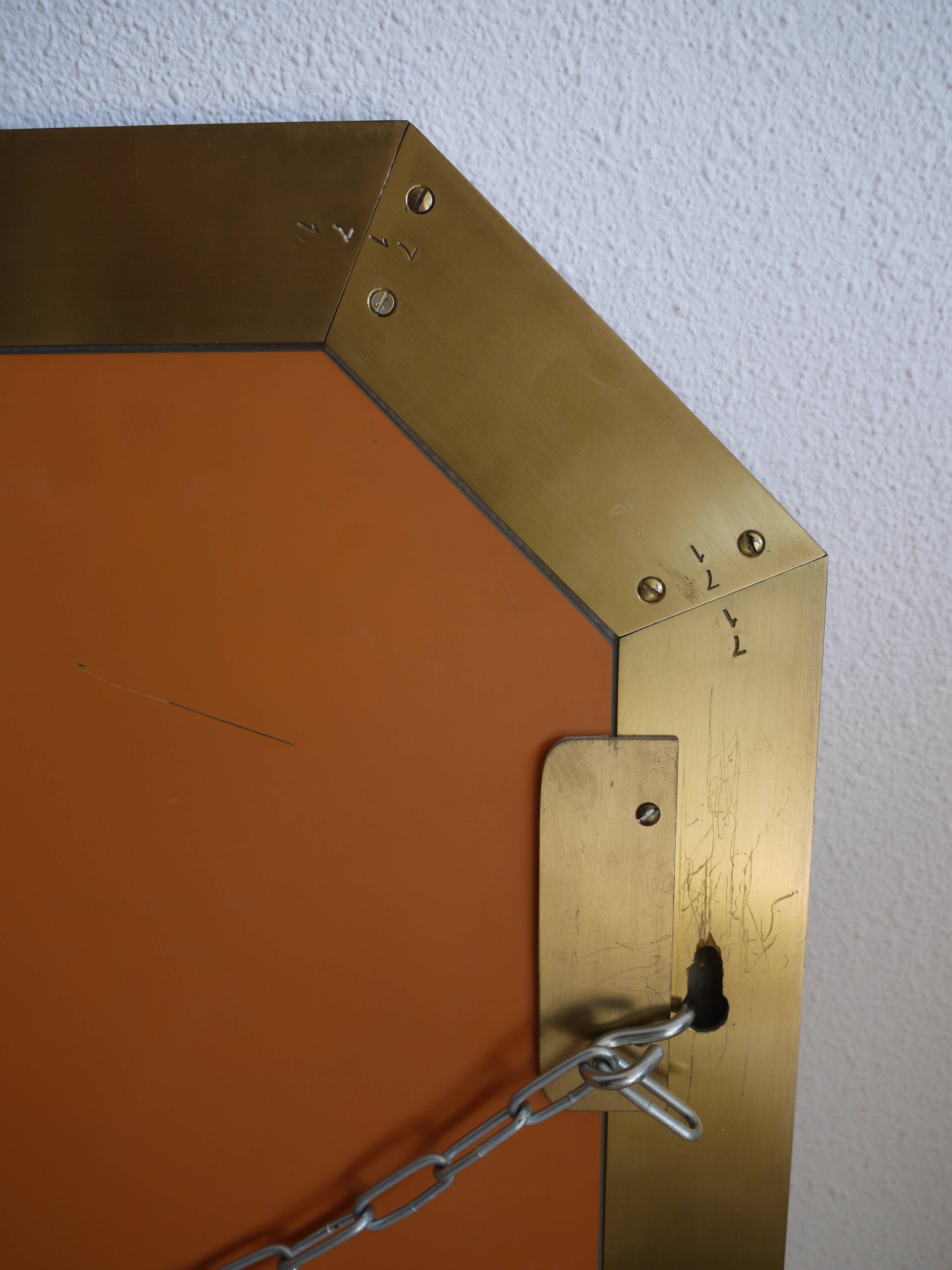 Modernist brass and glass console table & mirror. 1970s