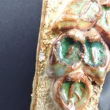 Flower-decorated sandstone mirror, circa 1970