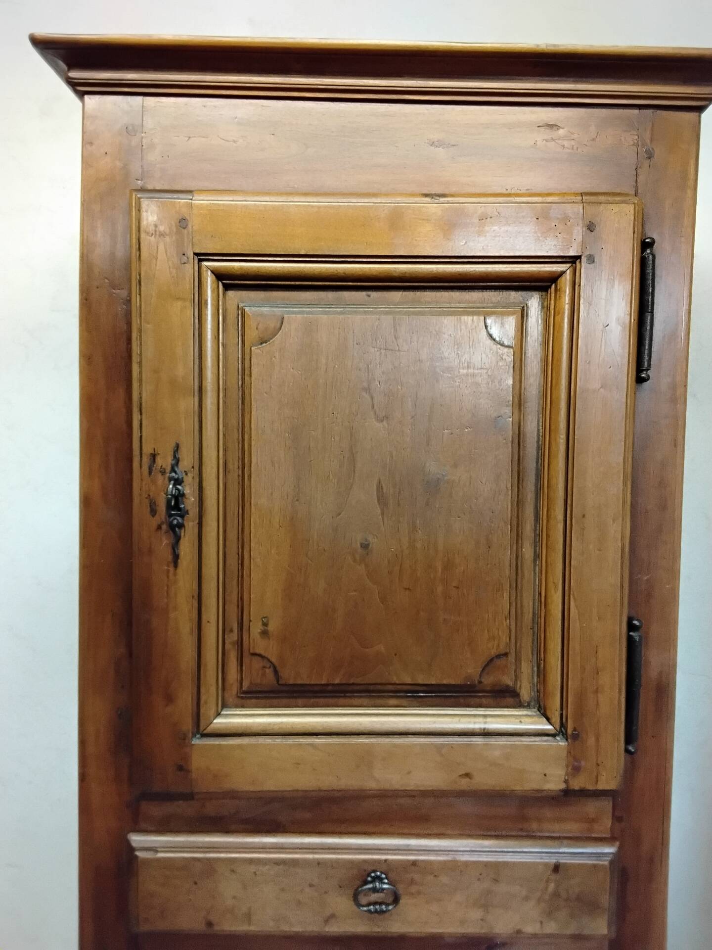 Antique wardrobe standing man