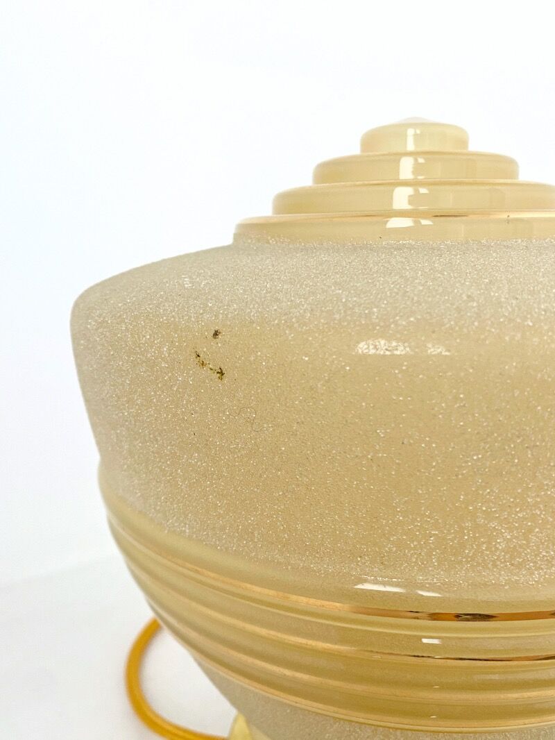 Old globe table lamp in beige and gold glass