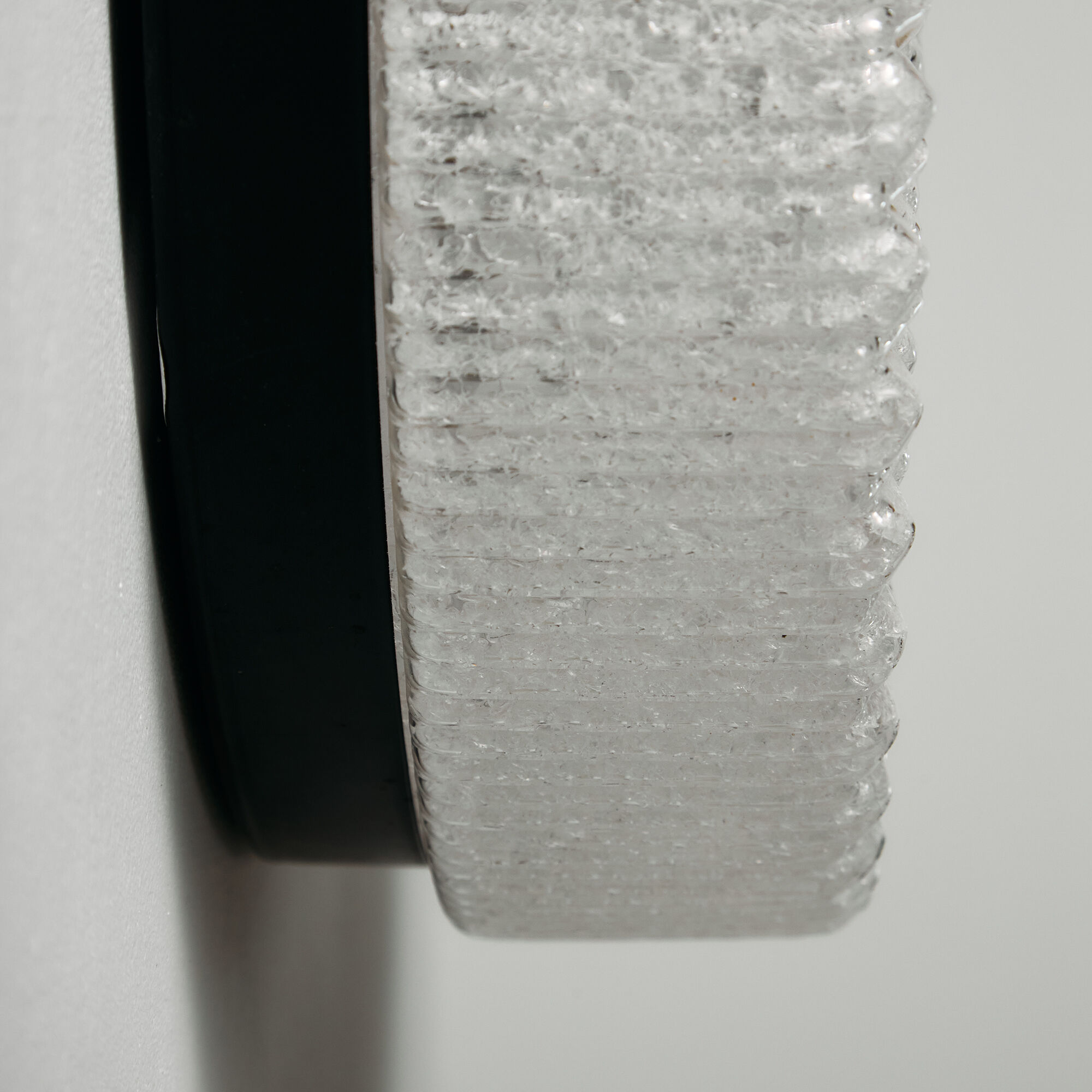 Applique murale en métal et plastique