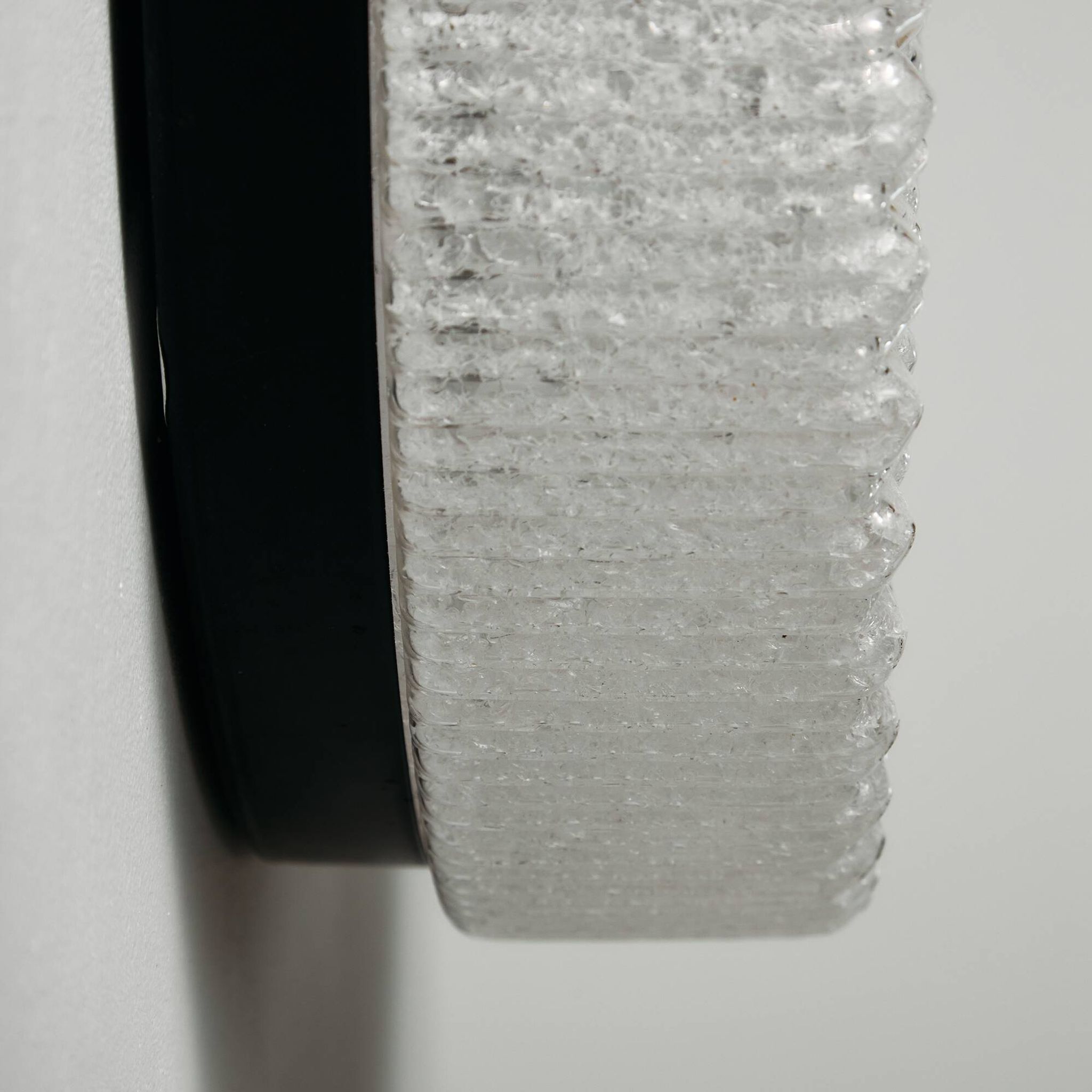 Wall light in metal and plastic