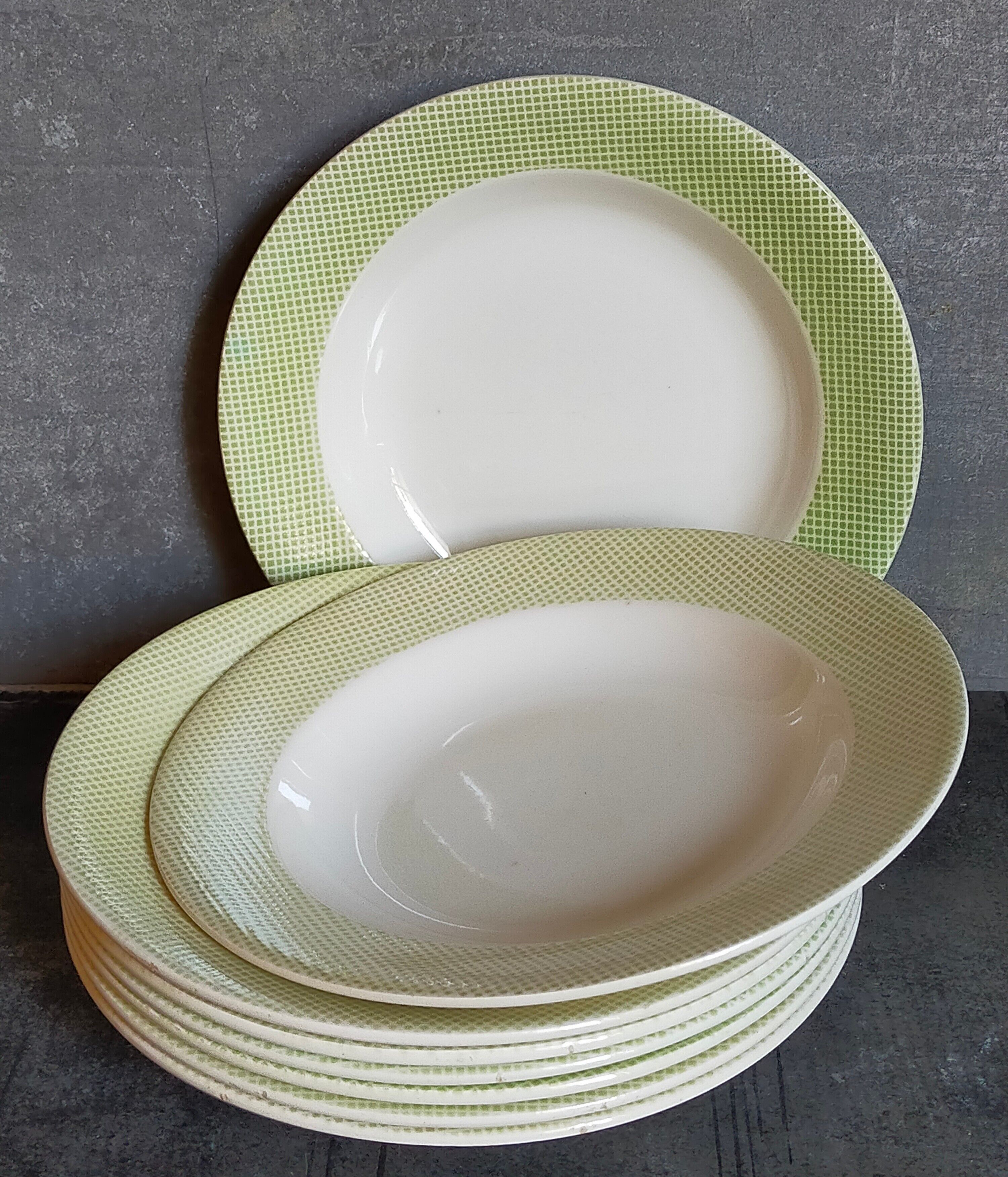 Eight earthenware plates from salins 50s