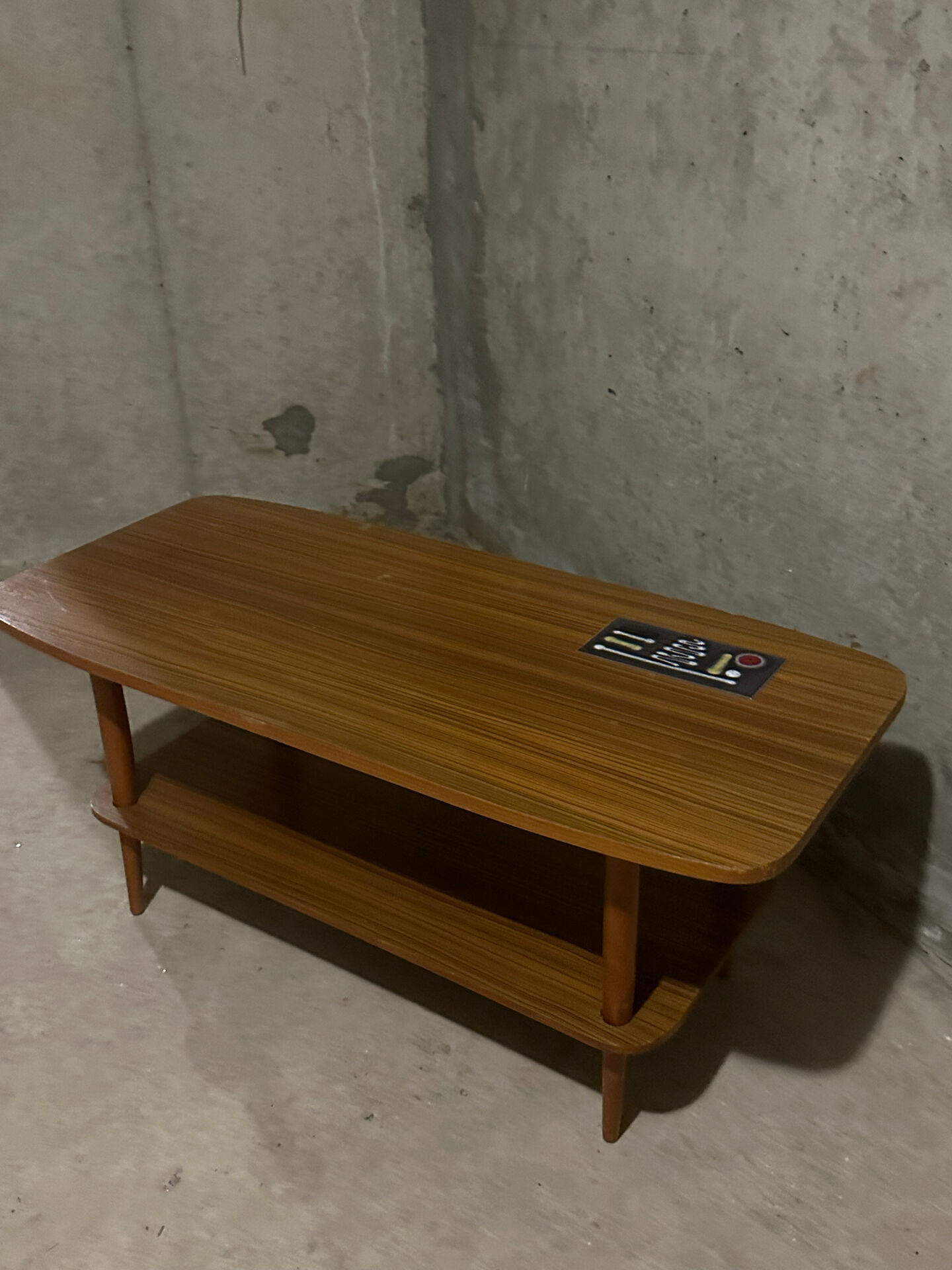 Scandinavian coffee table in teak and ceramic from the 1960s.