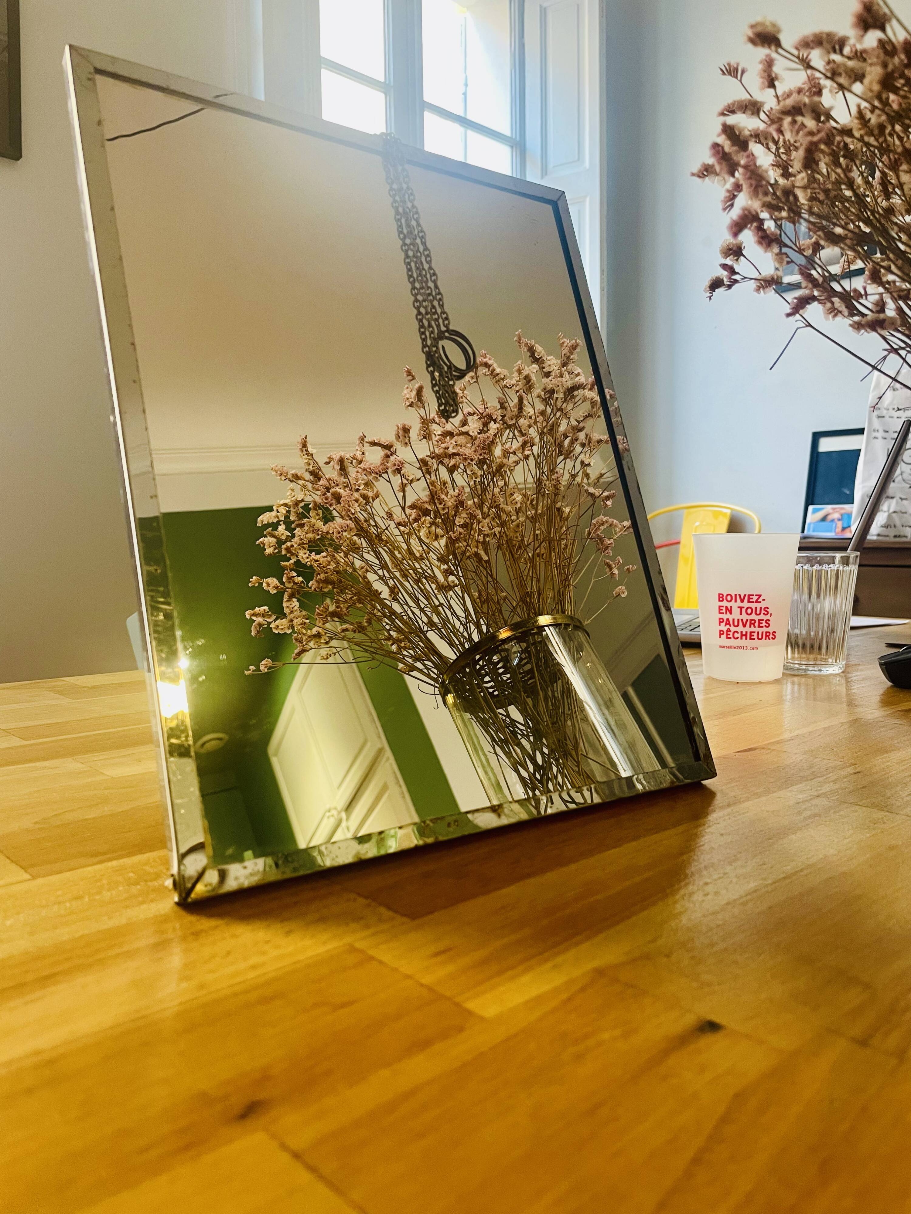 Barber mirror with chrome metal surround