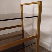 Brass shelf, smoked glass