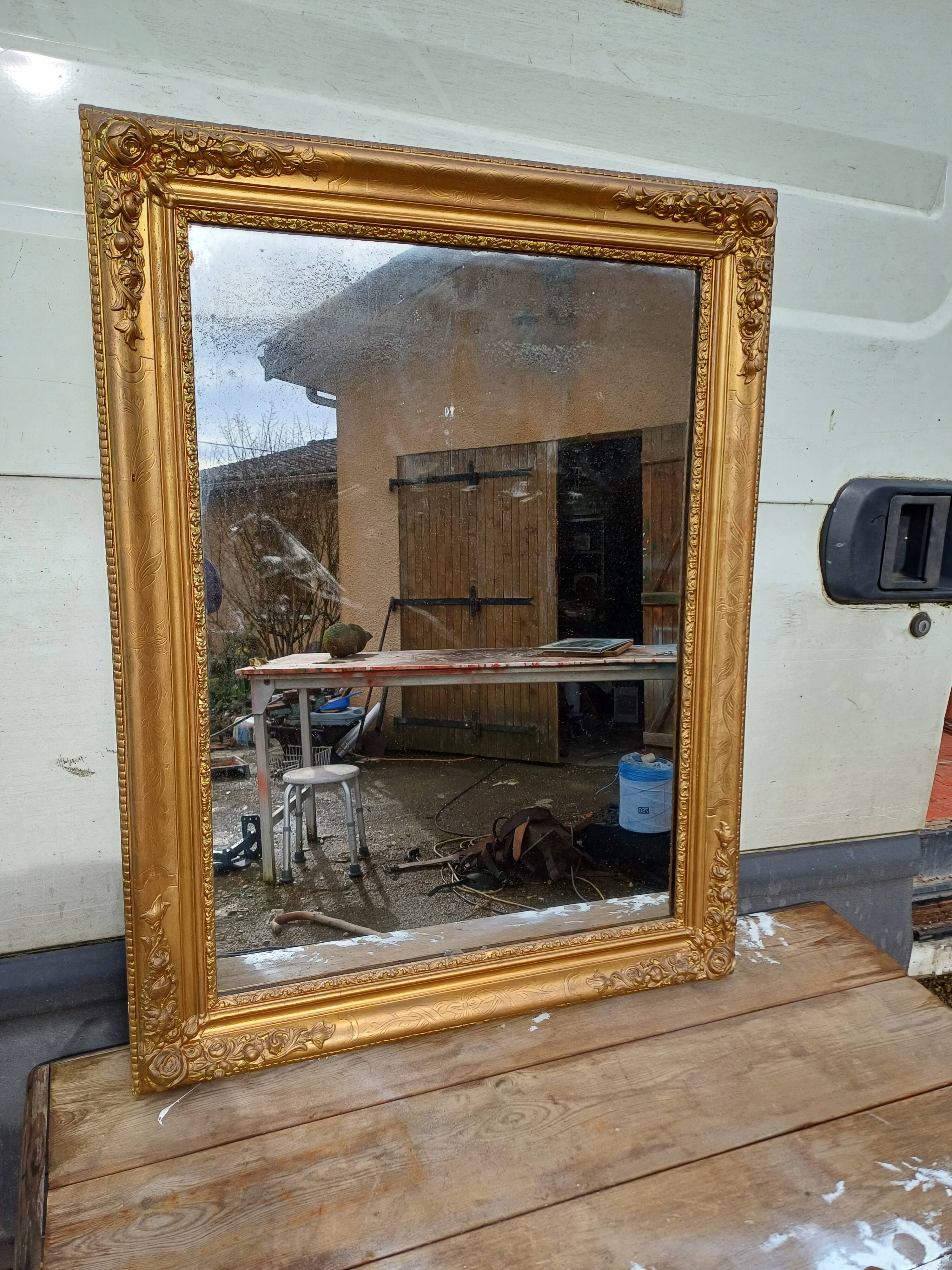 Wood mirror and golden Stuk