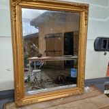 Wood mirror and golden Stuk