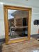 Wood mirror and golden Stuk