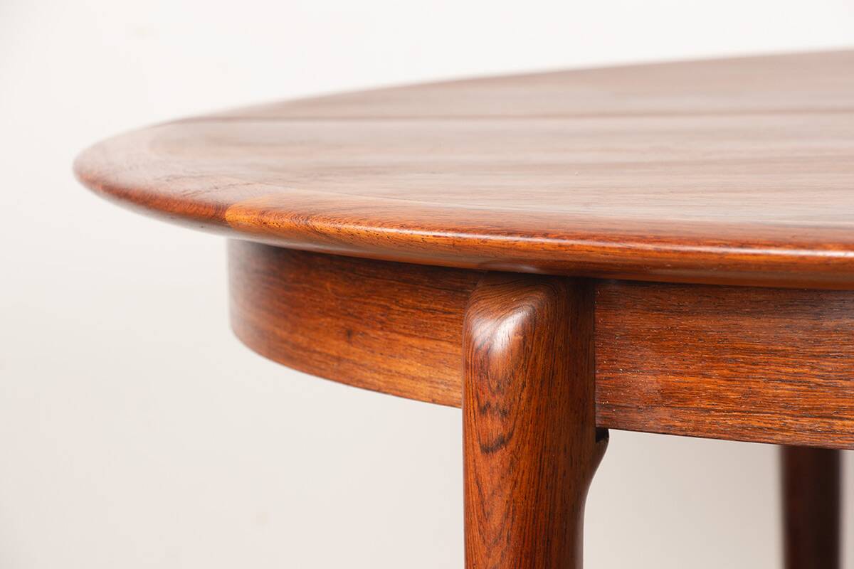 Danish extendable dining table in rosewood by Kai Lyngfeldt Larsen.