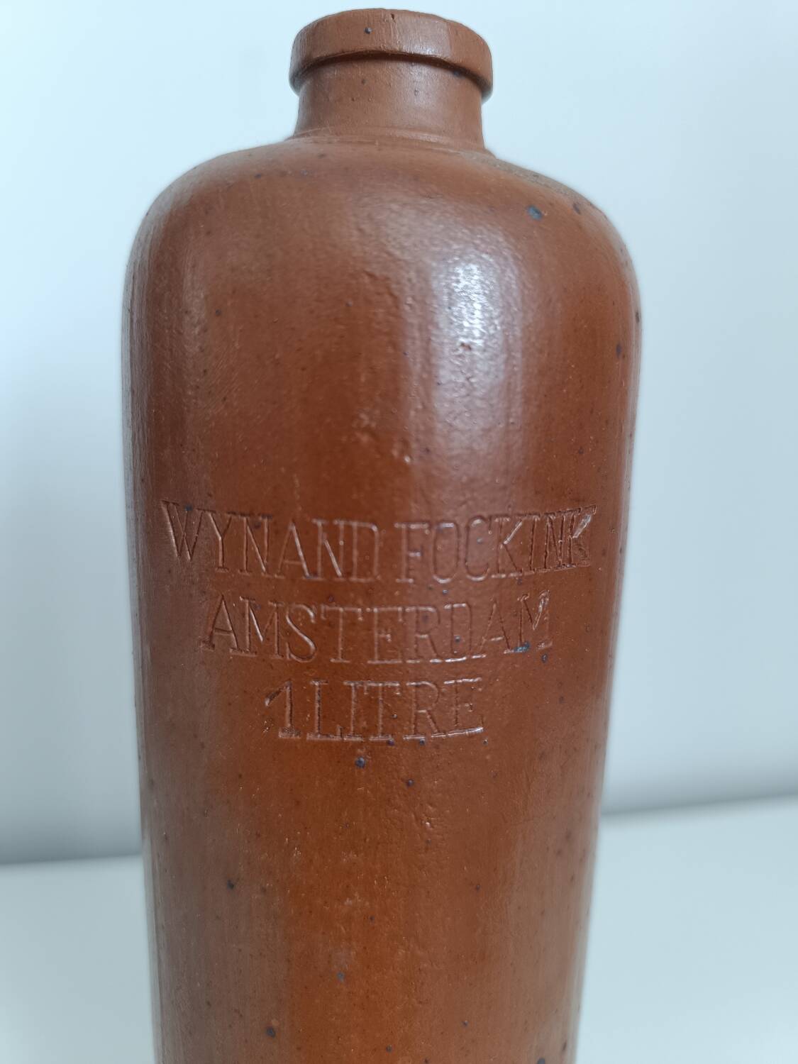 Antique stoneware gin bottle - stoneware vase