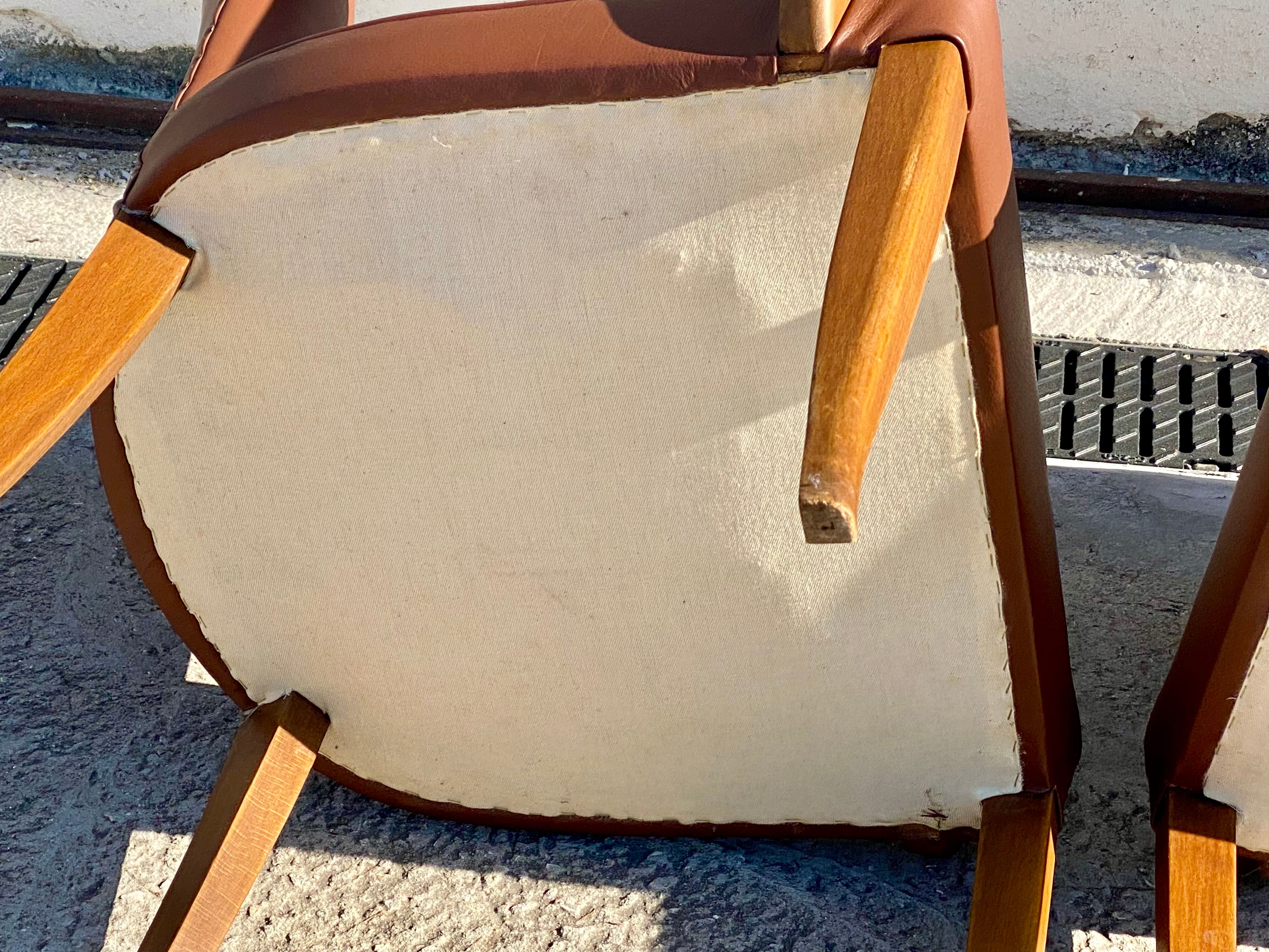 Pair of 50s bridge armchairs