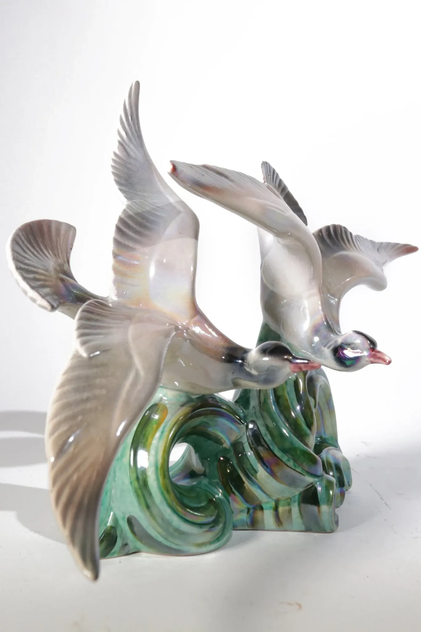 Art deco porcelain sculpture of two flying birds – iridescent, 1920s