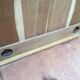 Vintage wardrobe compass feet with 3 sliding oak doors.