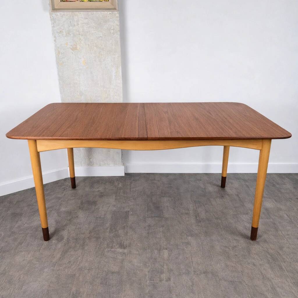 Rare teak and maple dining table with 2 extensions by Finn Juhl for Bovirke, Denmark, 1950.