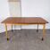 Rare teak and maple dining table with 2 extensions by Finn Juhl for Bovirke, Denmark, 1950.