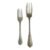Pair of metal forks, ornate design