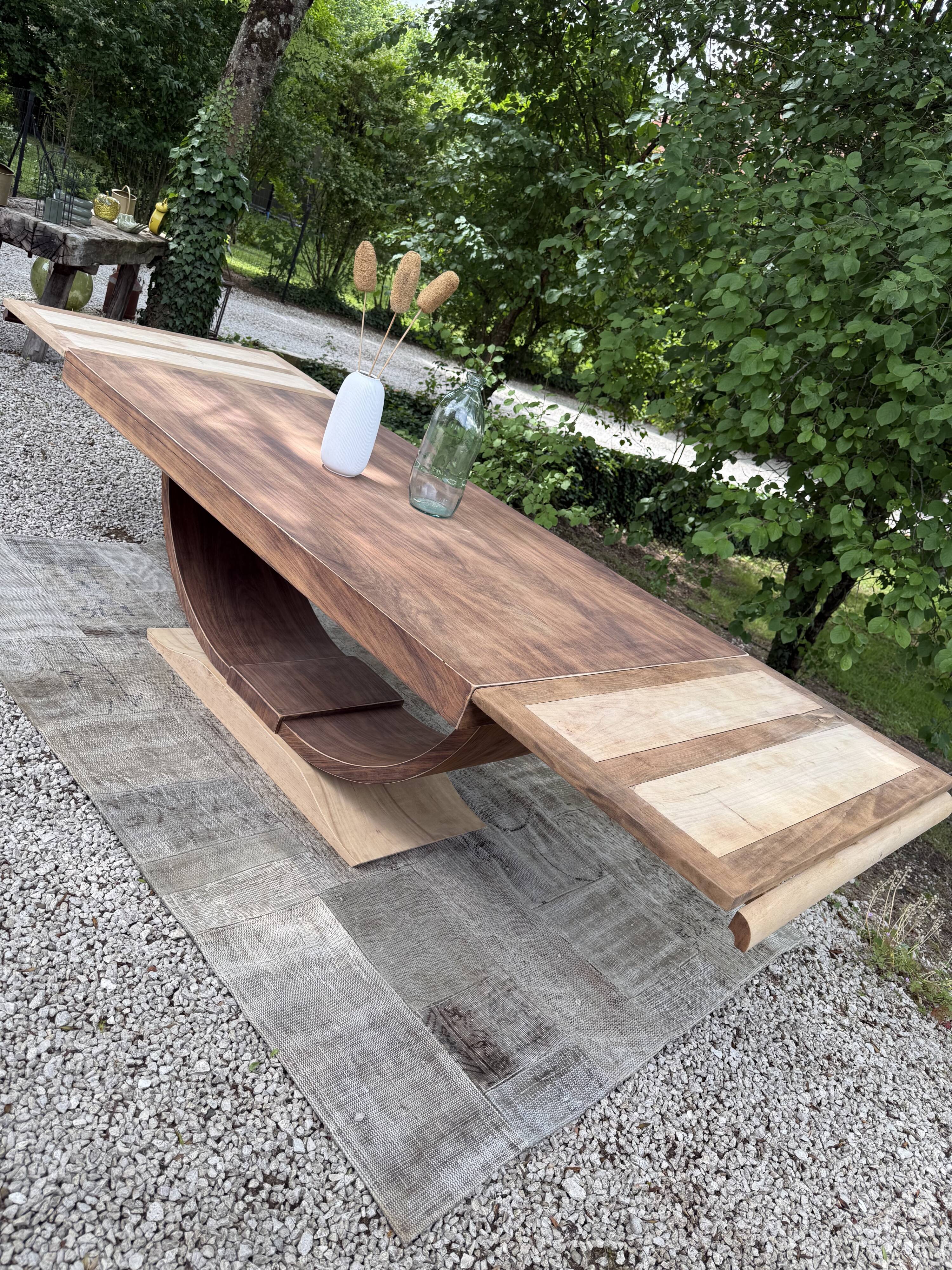 Renovated wooden table with extensions.