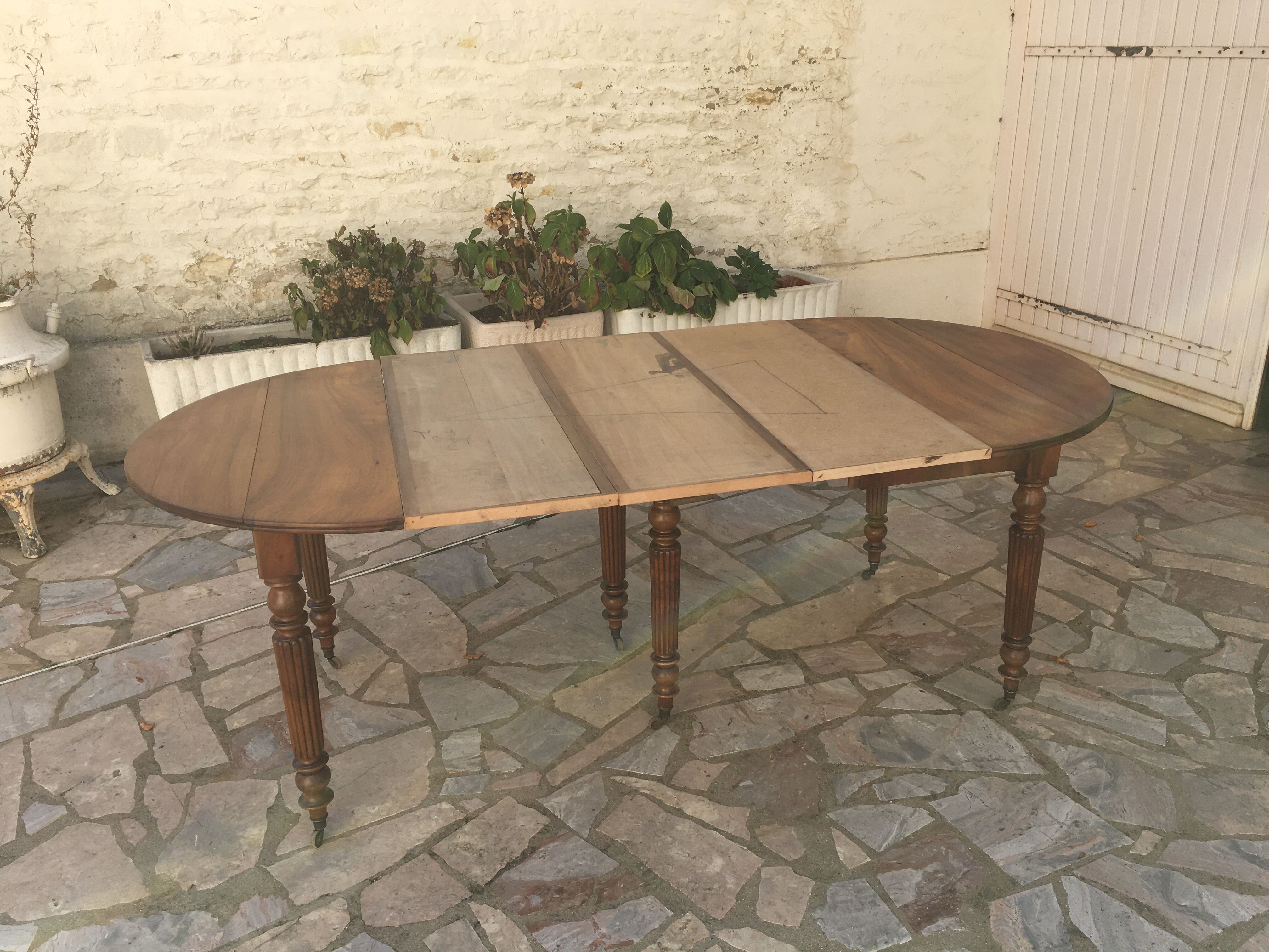 Round table 6 feet 3 solid walnut extensions