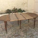Round table 6 feet 3 solid walnut extensions