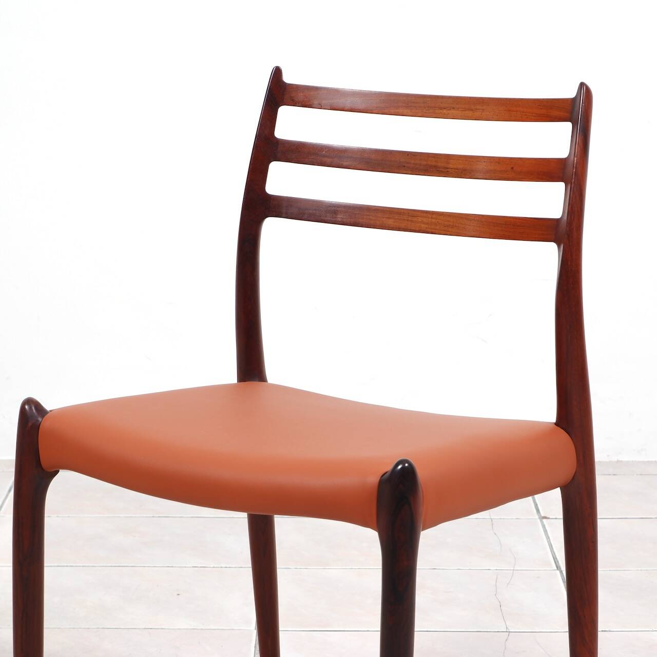 Set of 6 Niels Moller „Model 78“ rosewood dining chairs with cognac leather